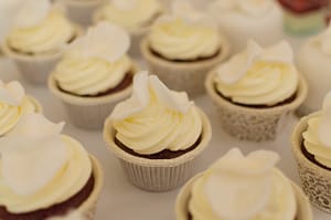 white cupcakes on the table